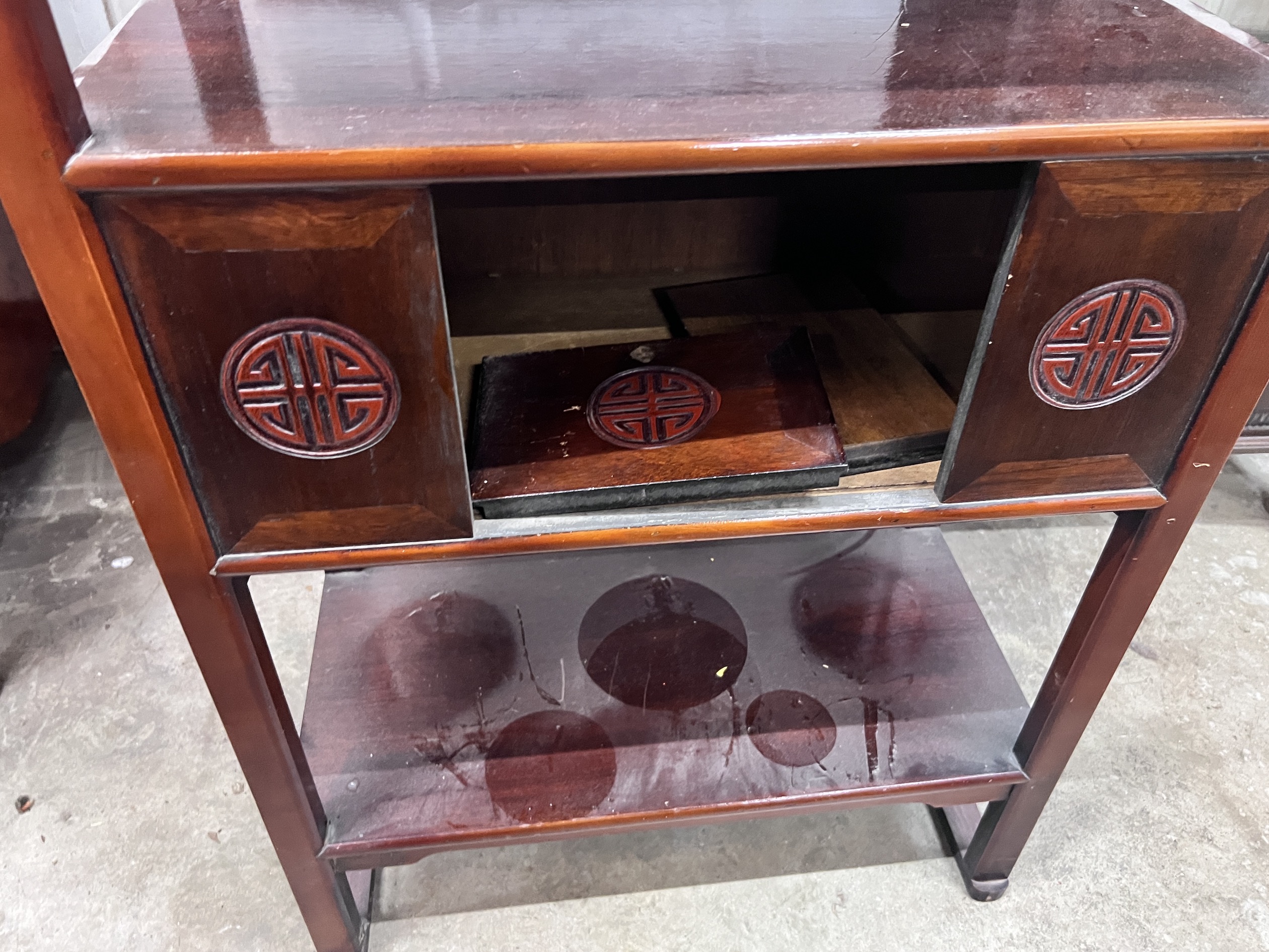 A Japanese hardwood three tier etagere, width 66cm, depth 31cm, height 98cm